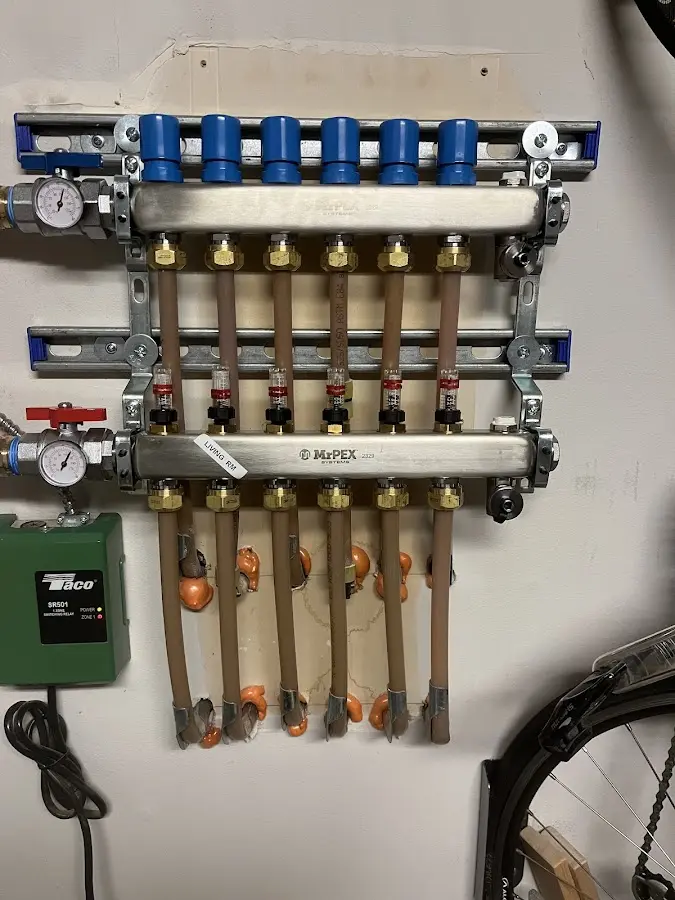 Plumber performing Water Heater Repair at a residential property in Granby